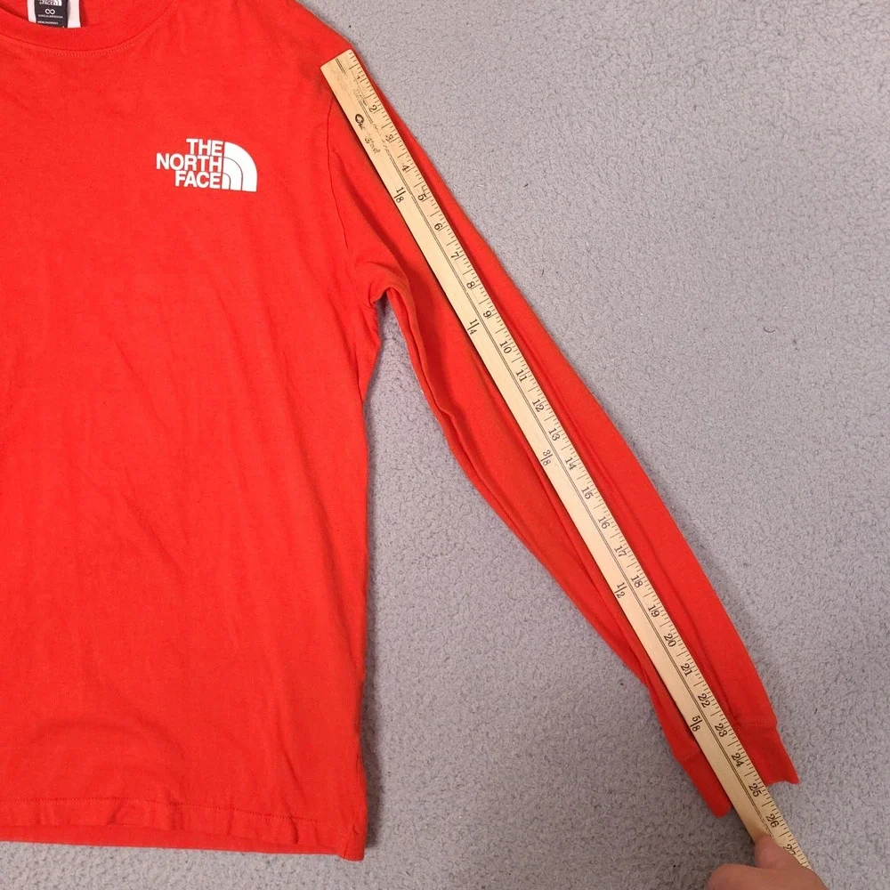 The North Face T-Shirt Mens Small Orange Circular Design Long Sleeve Graphic‎